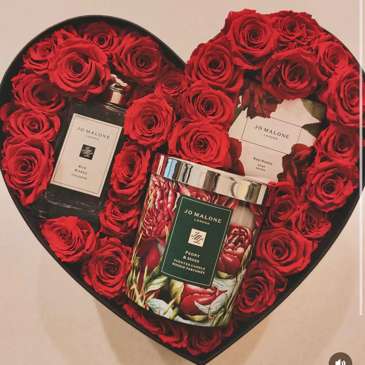 Jo Malone gift box with floral arrangement by Penny + Clover